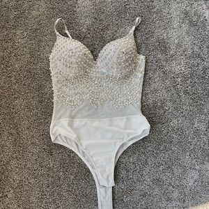 Windsor, women’s white body suit, size small.